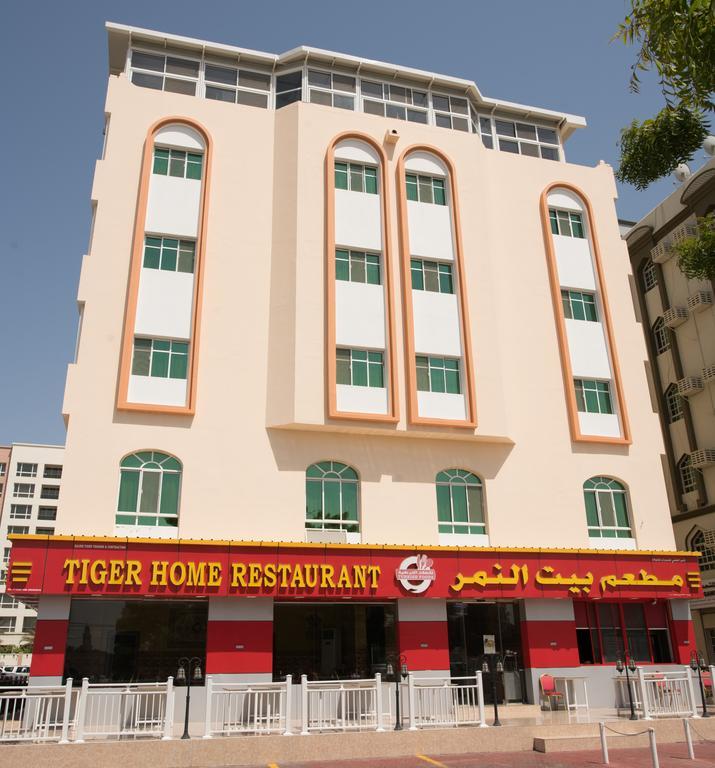 Tiger Home Hotel Apartments Muskat Bagian luar foto