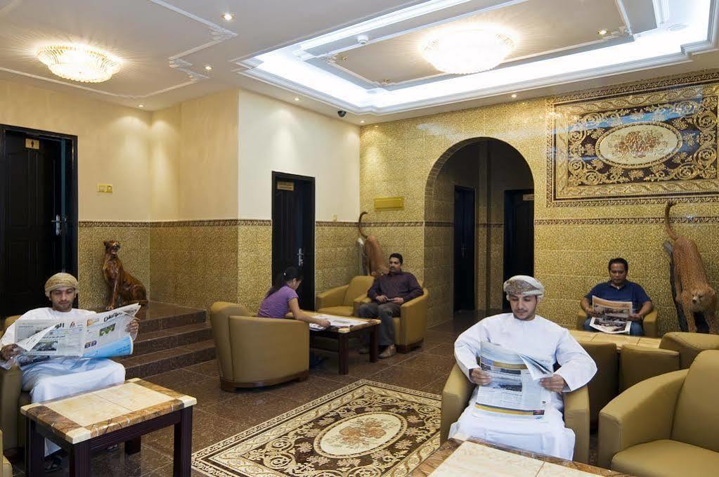 Tiger Home Hotel Apartments Muskat Bagian luar foto
