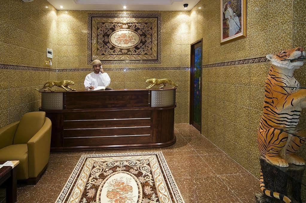 Tiger Home Hotel Apartments Muskat Bagian luar foto