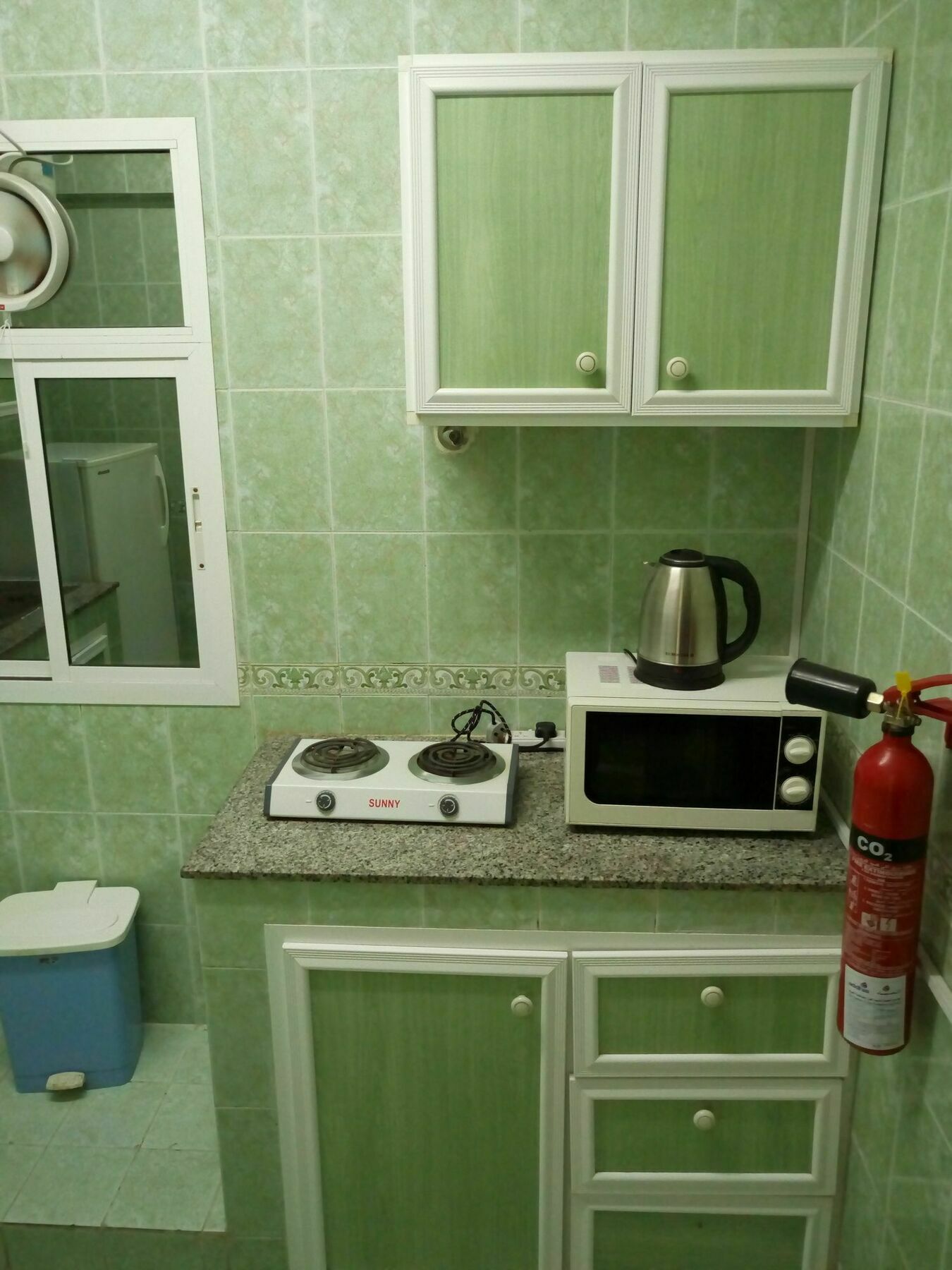 Tiger Home Hotel Apartments Muskat Bagian luar foto